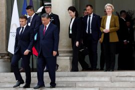 French President Emmanuel Macron and European Commission President Ursula von der Leyen accompany Chinese President Xi Jinping as he leaves the Elysee Palace in Paris, France [Gonzalo Fuentes/Reuters]