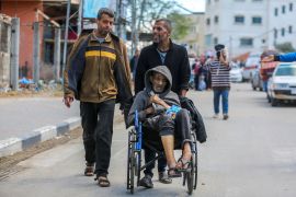 People flee the eastern parts of Rafah [Hatem Khaled/Reuters]