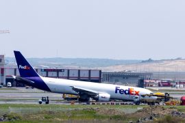 A general view of a FedEx Airlines Boeing 767 cargo plane, that landed at Istanbul Airport on Wednesday without deploying its front landing gear but managed to stay on the runway and avoid casualties [Umit Bektas/Reuters]
