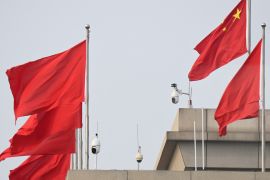 Article 19 says China is trying to reshape the way the internet operates [File: Parker Song/AFP]