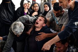 A Palestinian man mourns family members killed in Israeli bombing in Rafah in the southern Gaza Strip on April 20, 2024 [AFP]