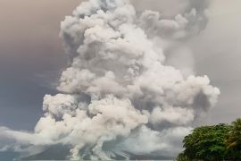 Towering clouds of ash and smoke from Mount Ruang volcano [AFP]