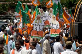Supporters of India&#039;s governing Bharatiya Janata Party (BJP) participate in a victory rally after the party won four seats in Telangana state, in Hyderabad on May 24, 2019 [File: Mahesh Kumar/AP]