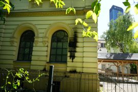Fire damage is visible on the facade of the Nozyk Synagogue in Warsaw, Poland, on May 1, 2024 [Czarek Sokolowsk/AP]