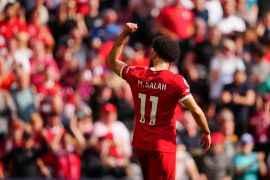 Liverpool&#039;s Mohamed Salah celebrates scoring his side&#039;s opening goal [Jon Super/AP]