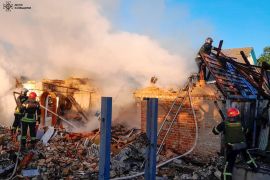 Emergency services work at a damaged building after a Russian missile attack in Kyiv region, Ukraine, on Wednesday, May 8, 2024 [Ukrainian State Emergency Service/AP]