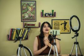 Historian Ruchika Sharma recording a video for her YouTube channel [Md Meharban/Al Jazeera]